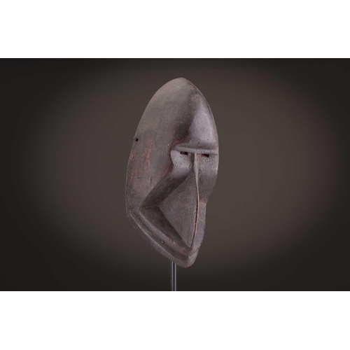 65 - A group of nine Dan masks, Liberia, to include two bird masks and three passport masks, 12.5cm - 32c... 