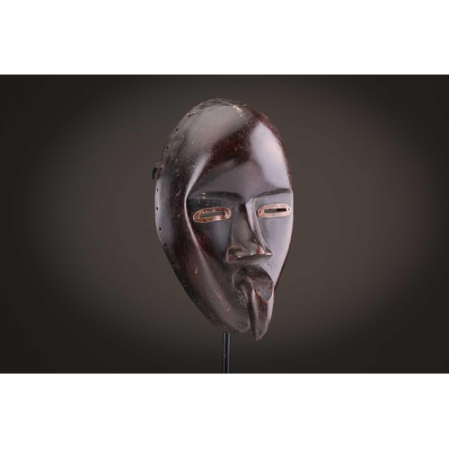 65 - A group of nine Dan masks, Liberia, to include two bird masks and three passport masks, 12.5cm - 32c... 