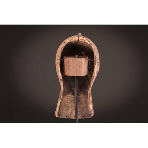 68 - Three Luba kifwebe, Democratic Republic of Congo, with incised linear decoration, painted in black &... 