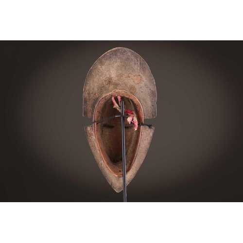 69 - Four Baule masks, Ivory Coast, three of zoomorphic form, one with linear coiffure, 33cm - 48.5cmThe ... 