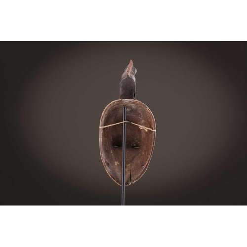 69 - Four Baule masks, Ivory Coast, three of zoomorphic form, one with linear coiffure, 33cm - 48.5cmThe ... 