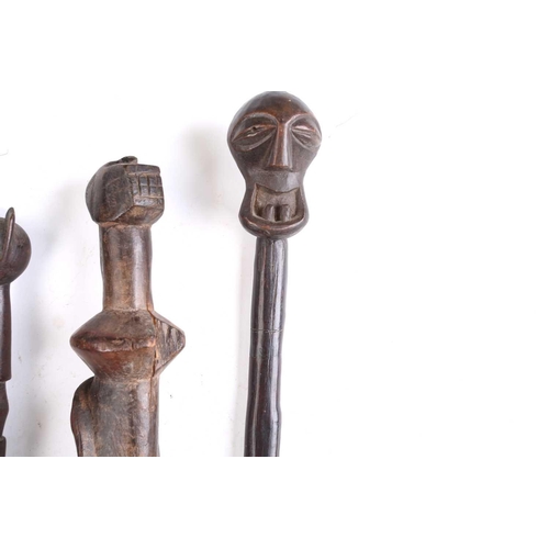 70 - A Luba spoon, Democratic Republic of Congo, with kneeling female handle, 23cm, a Songye spatula, wit... 