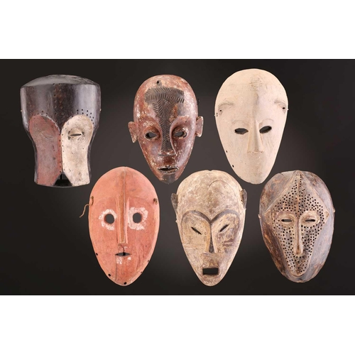 74 - A Ngbaka mask, Democratic Republic of Congo,the hollowed eye sockets painted red & white, the red ey... 