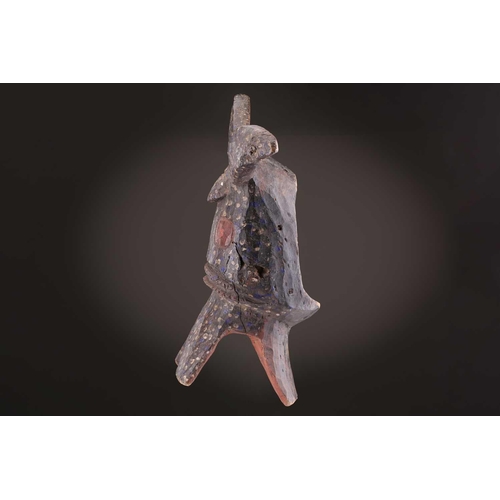 75 - A Mambila zoomorphic mask, Nigeria, painted with blue and white spots on a black ground, the mouth a... 