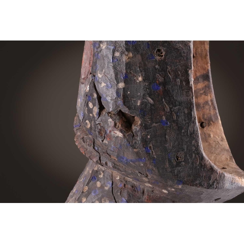 75 - A Mambila zoomorphic mask, Nigeria, painted with blue and white spots on a black ground, the mouth a... 