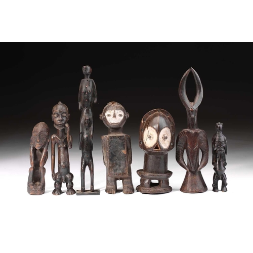 76 - A Ndaka (Ndaaka) figural drum, Democratic Republic of Congo, a vacant aperture to the crown of the h... 