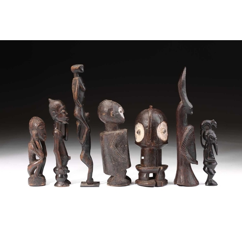 76 - A Ndaka (Ndaaka) figural drum, Democratic Republic of Congo, a vacant aperture to the crown of the h... 