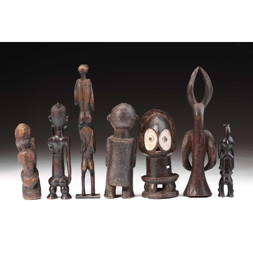 76 - A Ndaka (Ndaaka) figural drum, Democratic Republic of Congo, a vacant aperture to the crown of the h... 