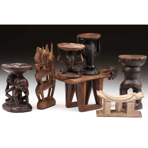 79 - A small Luba Hemba double caryatid stool, Democratic Republic of Congo, the oval top above a seated ... 
