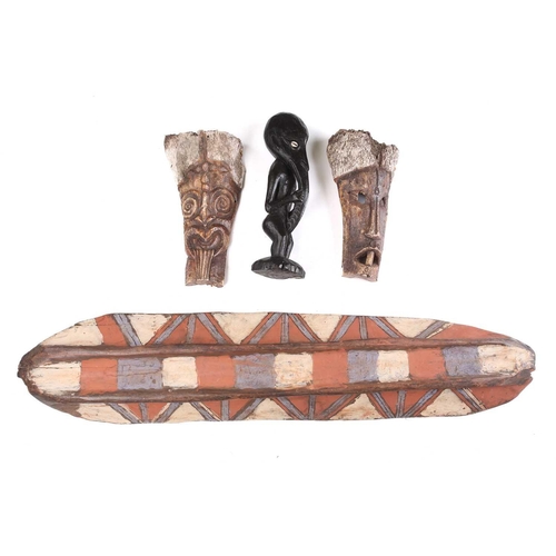 84 - A Sepik River ancestor figure, with cowrie shell eyes and long beak, 41.5cm, two South Seas animal b... 