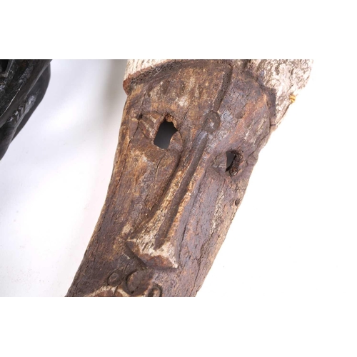 84 - A Sepik River ancestor figure, with cowrie shell eyes and long beak, 41.5cm, two South Seas animal b... 