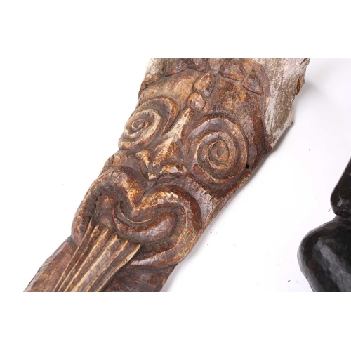 84 - A Sepik River ancestor figure, with cowrie shell eyes and long beak, 41.5cm, two South Seas animal b... 