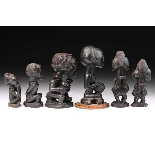 88 - A group of Luba/Hemba figures, Democratic Republic of Congo, comprising two Janus figures, the femal... 