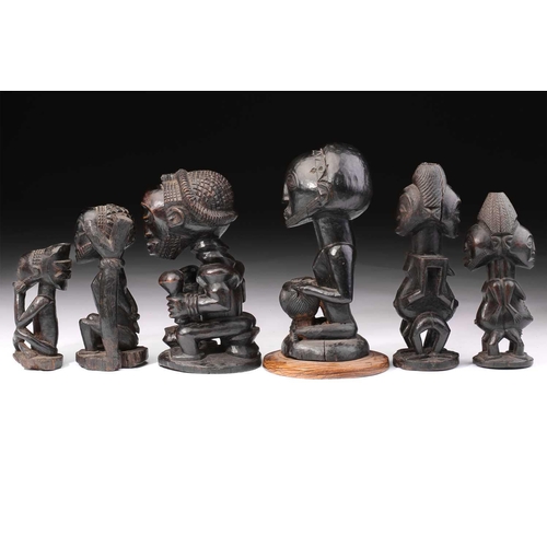 88 - A group of Luba/Hemba figures, Democratic Republic of Congo, comprising two Janus figures, the femal... 