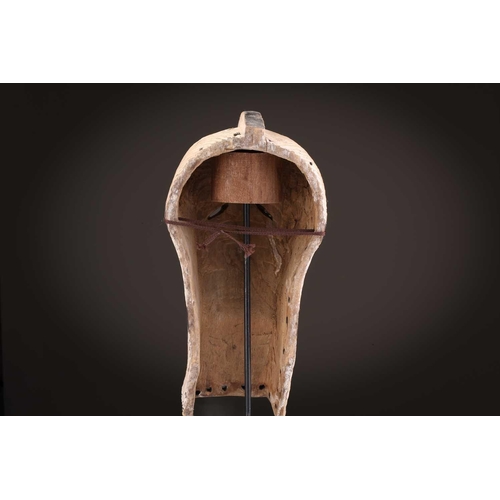 89 - A Songye Kikashi kifwebe, Democratic Republic of Congo, with fine incised linear carving and protrud... 