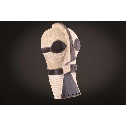 89 - A Songye Kikashi kifwebe, Democratic Republic of Congo, with fine incised linear carving and protrud... 