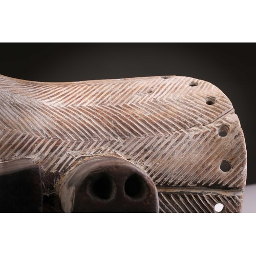 90 - Two Songye/Luba female Bifwebe masks, Bikashi, each with fine linear decoration, the eyes, nose and ... 