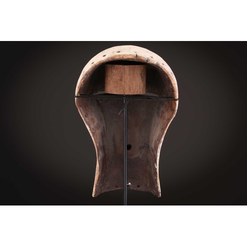90 - Two Songye/Luba female Bifwebe masks, Bikashi, each with fine linear decoration, the eyes, nose and ... 