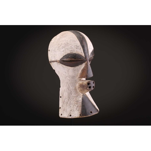 90 - Two Songye/Luba female Bifwebe masks, Bikashi, each with fine linear decoration, the eyes, nose and ... 
