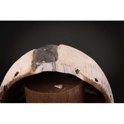 90 - Two Songye/Luba female Bifwebe masks, Bikashi, each with fine linear decoration, the eyes, nose and ... 