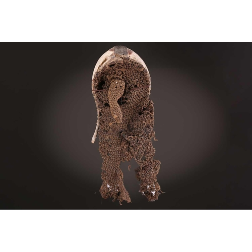 91 - Two Songye kifwebe, Democratic Republic of Congo, the male mask with a tall crest, with butterfly sh... 