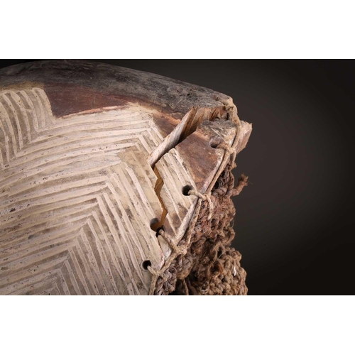 91 - Two Songye kifwebe, Democratic Republic of Congo, the male mask with a tall crest, with butterfly sh... 