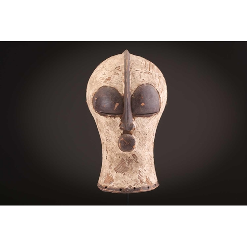 94 - Two Songye Bilume Kifwebe, Democratic Republic of Congo, each with a short pointed crest and oversiz... 