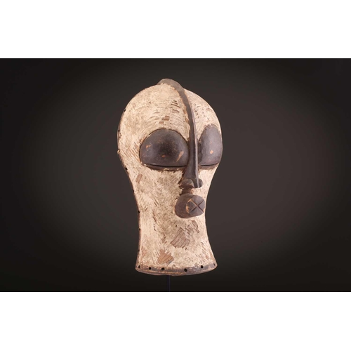 94 - Two Songye Bilume Kifwebe, Democratic Republic of Congo, each with a short pointed crest and oversiz... 