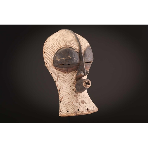 94 - Two Songye Bilume Kifwebe, Democratic Republic of Congo, each with a short pointed crest and oversiz... 
