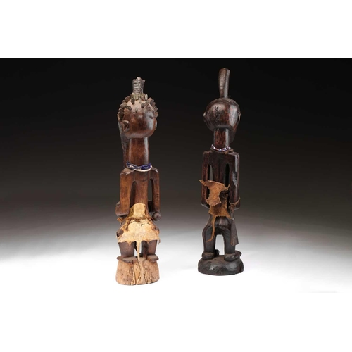 97 - A Songye standing male power figure, Nikisi, Democratic Republic of Congo, with horn charge with ins... 
