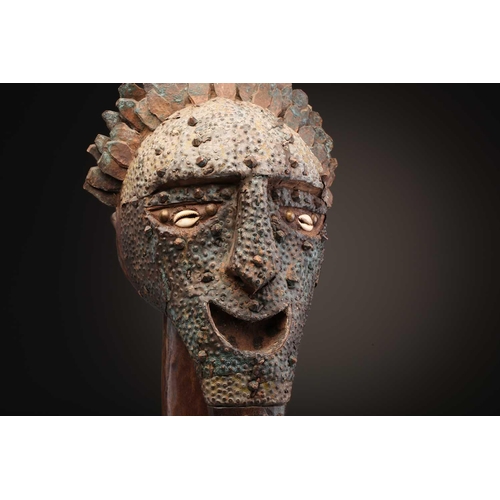 97 - A Songye standing male power figure, Nikisi, Democratic Republic of Congo, with horn charge with ins... 