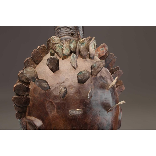 97 - A Songye standing male power figure, Nikisi, Democratic Republic of Congo, with horn charge with ins... 