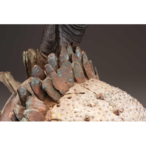 97 - A Songye standing male power figure, Nikisi, Democratic Republic of Congo, with horn charge with ins... 