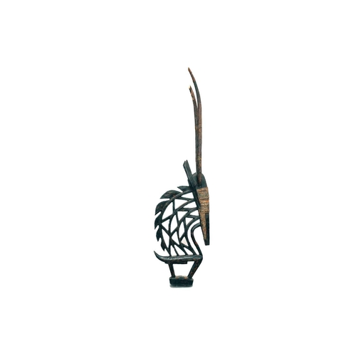 98 - A Bambara Chiwara headdress, Mali, in the typical form of a male Roan antelope, the head with applie... 
