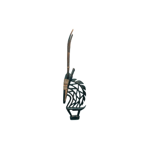 98 - A Bambara Chiwara headdress, Mali, in the typical form of a male Roan antelope, the head with applie... 