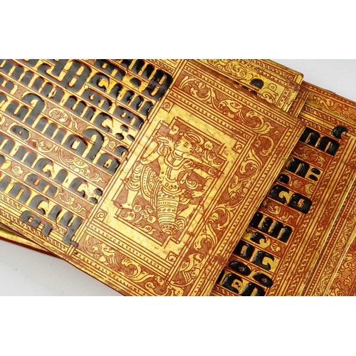 108 - A Burmese Kammavaca manuscript, 20th century, sixteen inscribed in black ink on red lacquer and gilt... 