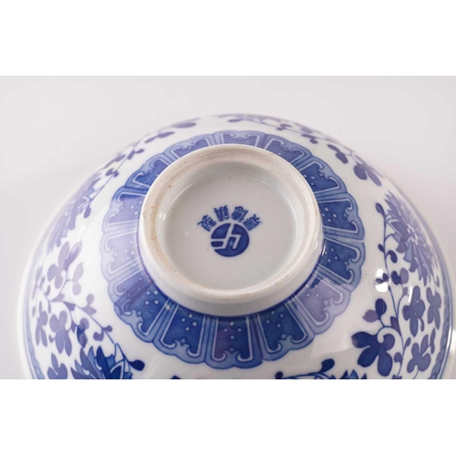 144 - A Chinese blue and white bowl, decorated with lotus and blooms, 7cm high x 16.3 cm diameter, togethe... 