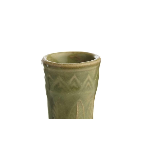 158 - A Chinese celadon double wall pierced vase, the neck with moulded banana leaves above the pierced bo... 