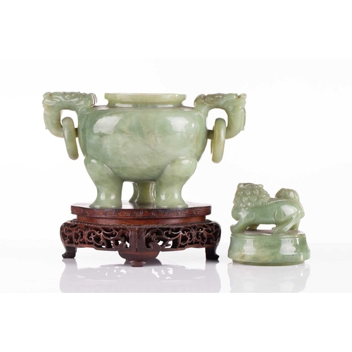 182 - A Chinese apple green jade censor, 20th century, the cover with lion finial, with lion mask and capt... 