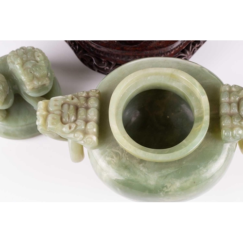 182 - A Chinese apple green jade censor, 20th century, the cover with lion finial, with lion mask and capt... 