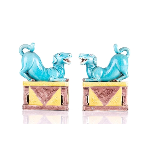 184 - A pair of Chinese torquoise glazed dogs, Qing 19th century, modelled baying with open mouth showing ... 