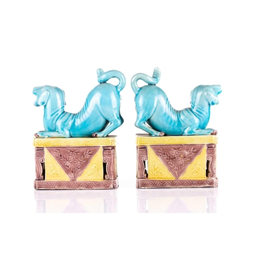 184 - A pair of Chinese torquoise glazed dogs, Qing 19th century, modelled baying with open mouth showing ... 