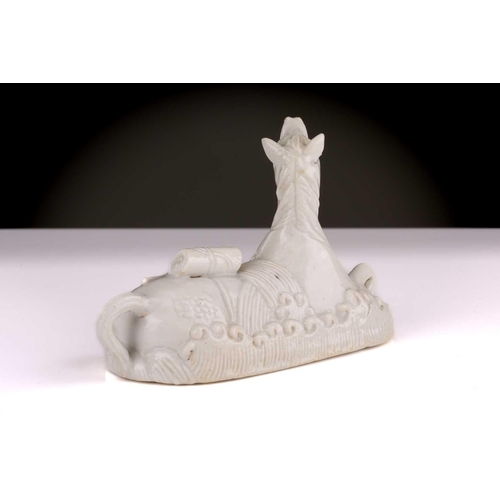 193 - A Chinese Dehua blanc de chine white horse of wisdom, Qing dynasty, 18th century, carrying a Buddhis... 