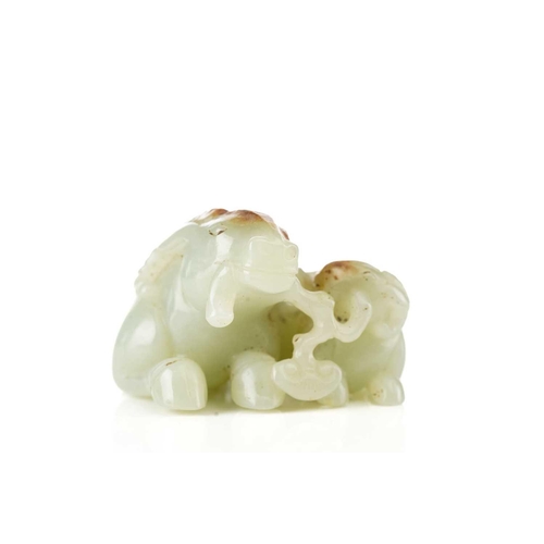 201 - A Chinese jade figure of a ram and its young, in a recumbent pose, each sharing a single stem of lin... 