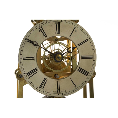 301 - A 19th century single fusee gothic skeleton clock, the silvered chapter ring with Roman numerals, in... 