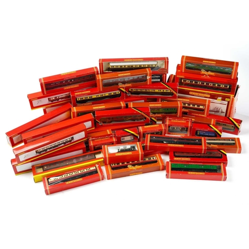 310 - A large quantity of boxed Hornby Railways rolling stock, largely carriages, together with a R179 Gra... 