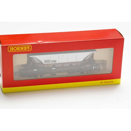 319 - A large quantity of boxed Hornby Railways rolling stock, largely carriages, with some wagons.Appear ... 