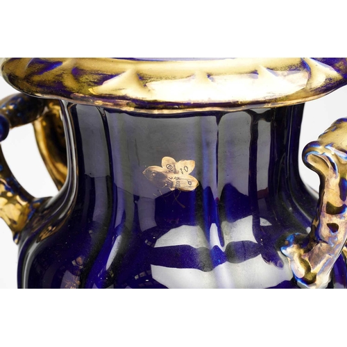 329 - A Masons ironstone two-handled vase and cover, C1820, the cobalt blue cover and body with parcel gil... 