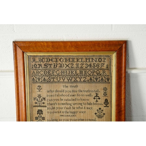 358 - A Victorian woolwork alphabetical sampler with moral verse and stylized shrubs birds geometric borde... 