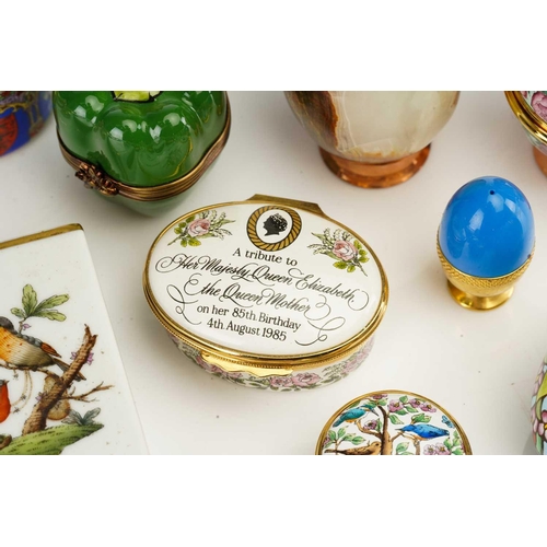 361 - A collection of Halcyon Days hard enamelled patch boxes and eggs to include Her Majesty Queen Elizab... 